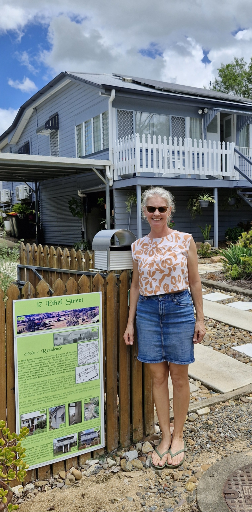 Sharyn Kassulke with sign at 17 Ethel Street.