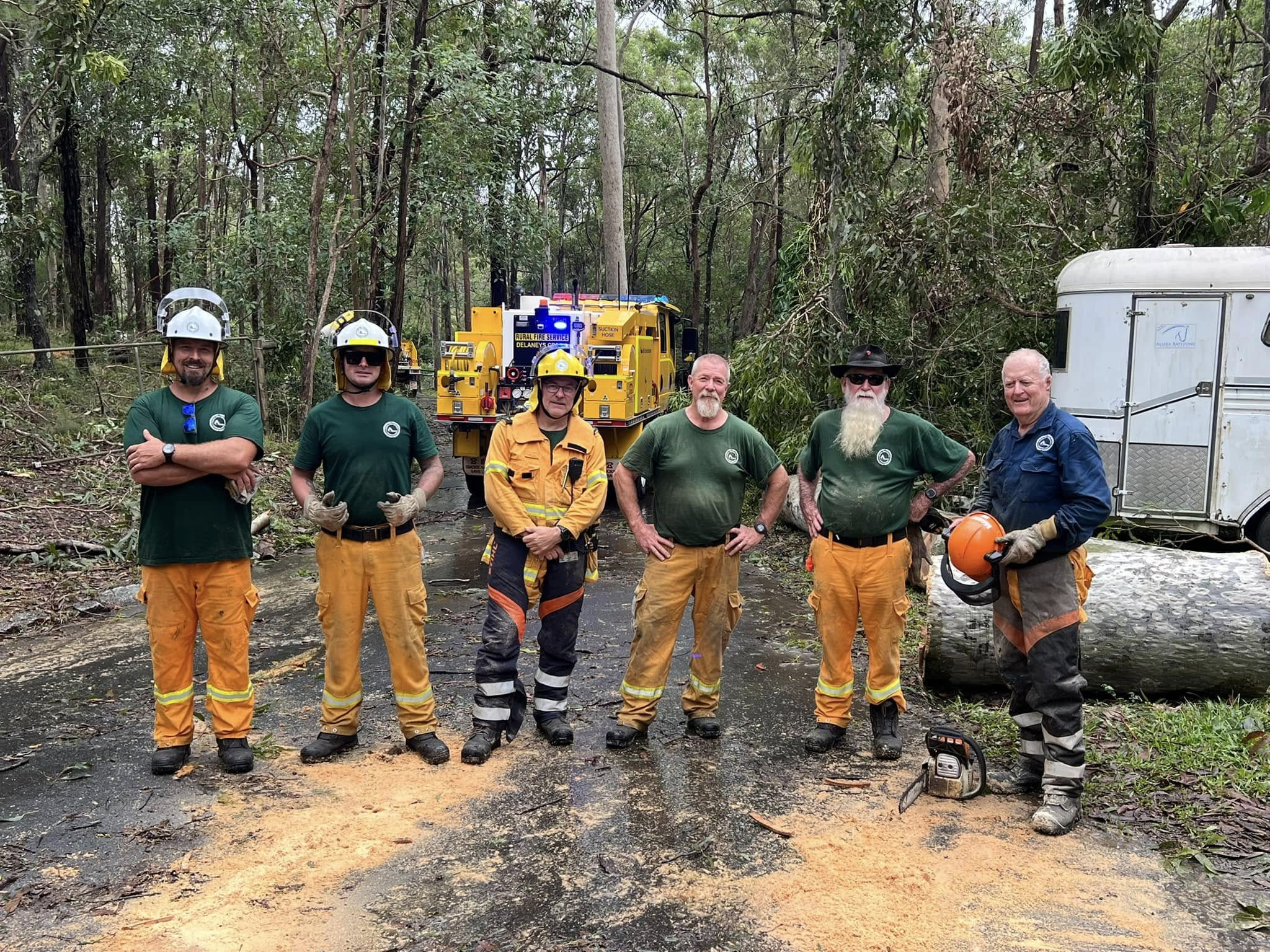 Delaneys Creek Rural Fire Service helping in damage clean up. Photo: Facebook.