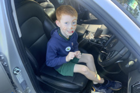 Ryder enjoys his time in a police car.