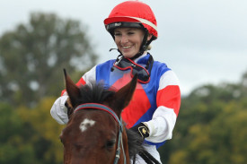 Lilli Barr is all smiles after riding rank outsider Roman Reign to victory in race four at Kilcoy. Photo credit: Ross Stevenson.