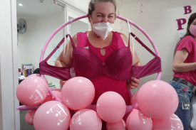 Embracia Woodford manager Natalie Chilcott has some fun at Go Pink Day.
