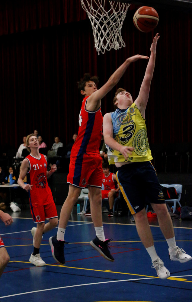 St. Columban’s basketball “Firsts” team captain Darcy Robinson in action.