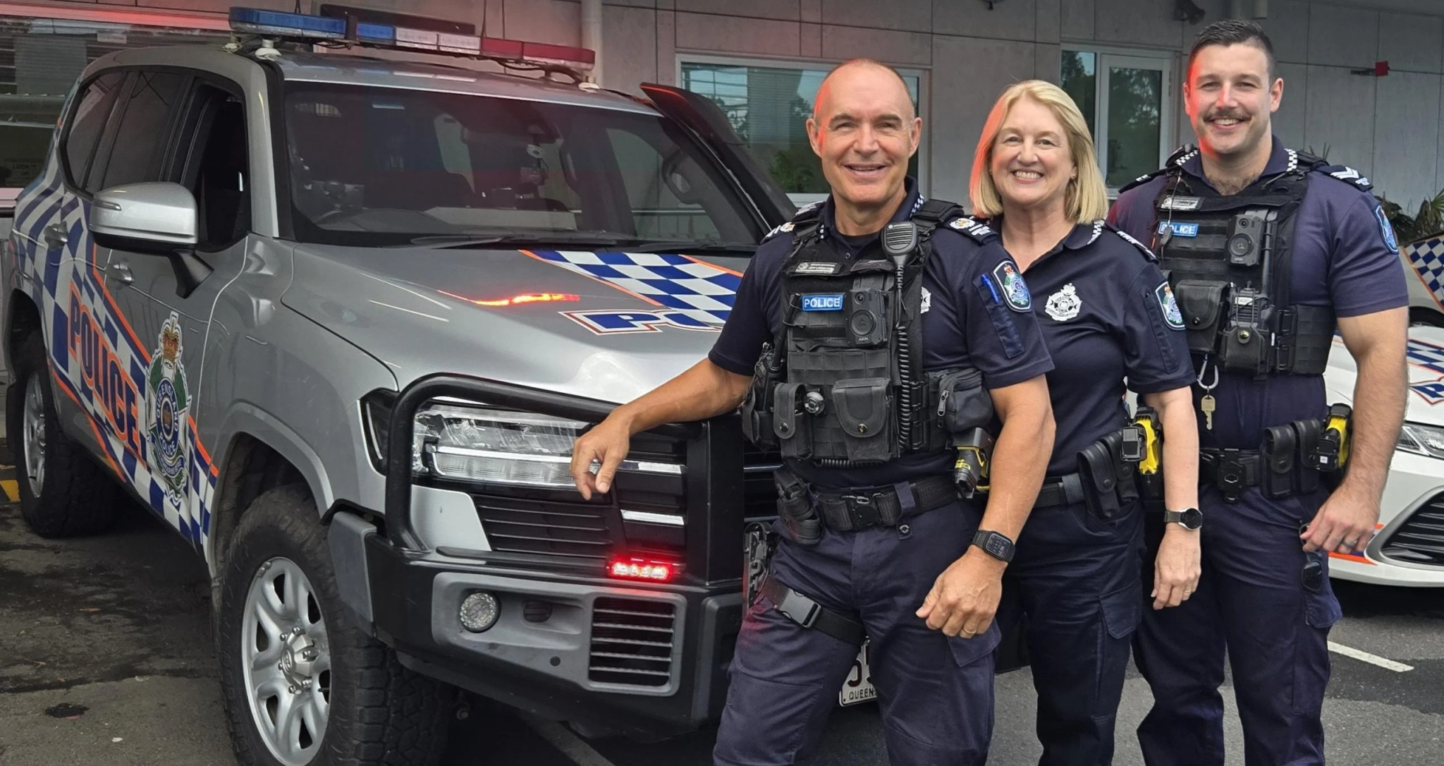 Senior Sergeant Jeff Lansdown with wife Deborah and son Bryce on last day.
