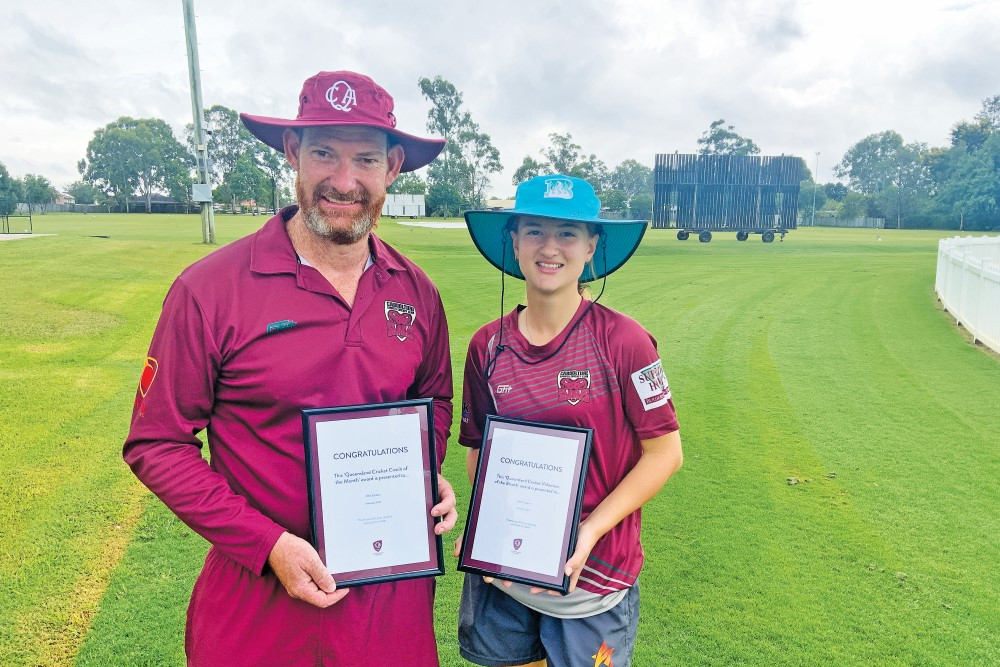 Caboolture cricket coaches Phil Sisson and Maddy Bingham with their awards, acknowledging their contributions to junior cricket