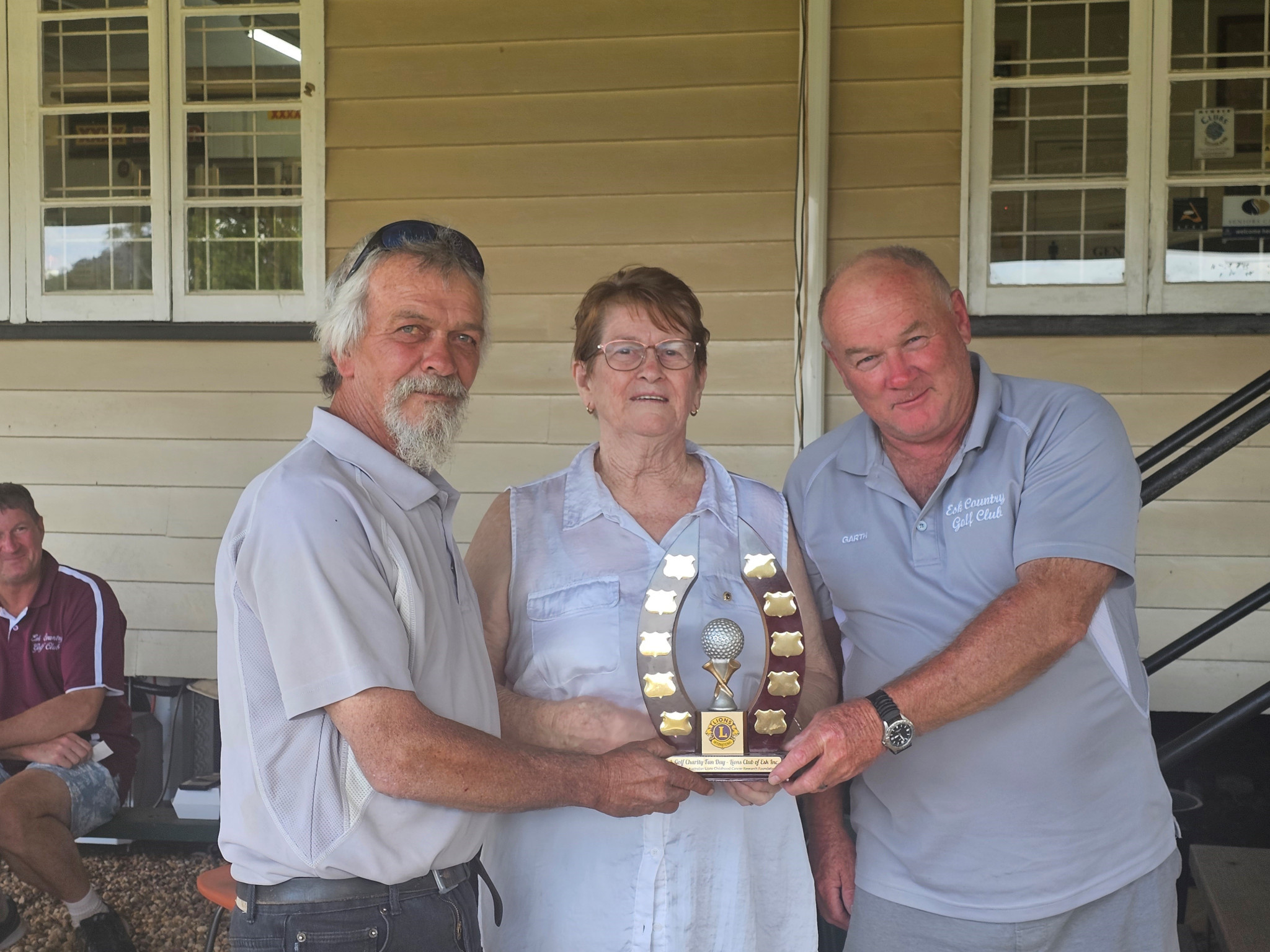 Esk charity golf winners Brett Farnham and Garth Wilson with Lucille Hedges (middle).