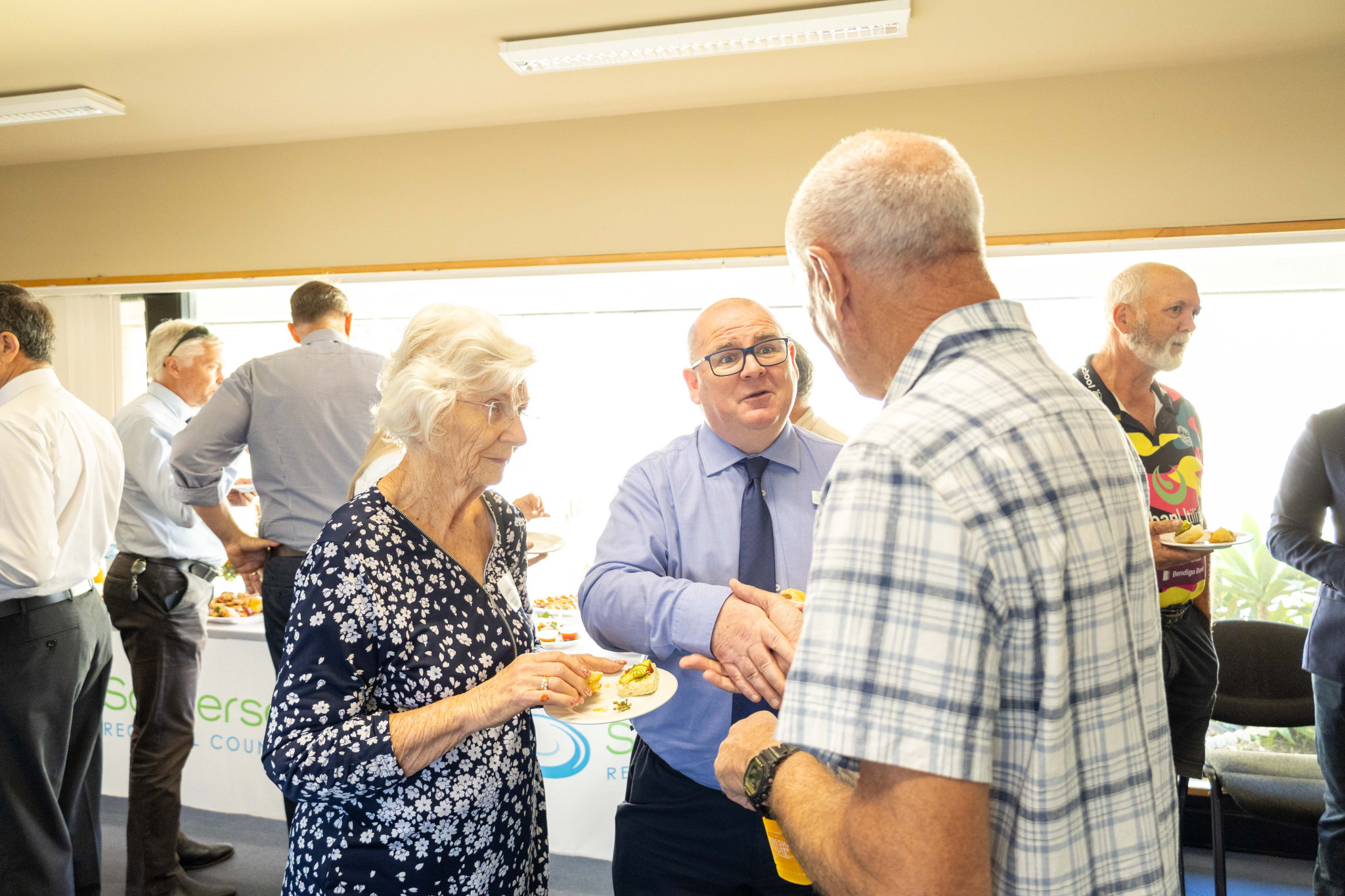 SRC Engineering Services Manager Gary Love (middle) speaking with Julia Caunce and Steve Cranstoun from Fernvale Community Association.