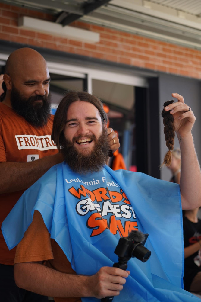 The School Chaplain, Lachie, shaved off his iconic hair and beard and raised over $3,000. Photo courtesy of the Grace Lutheran College Film Crew.