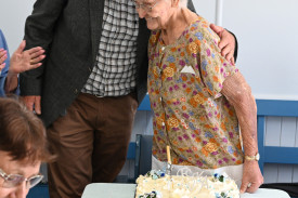 Mayor Wendt with 92-year-old Glenda and cake.