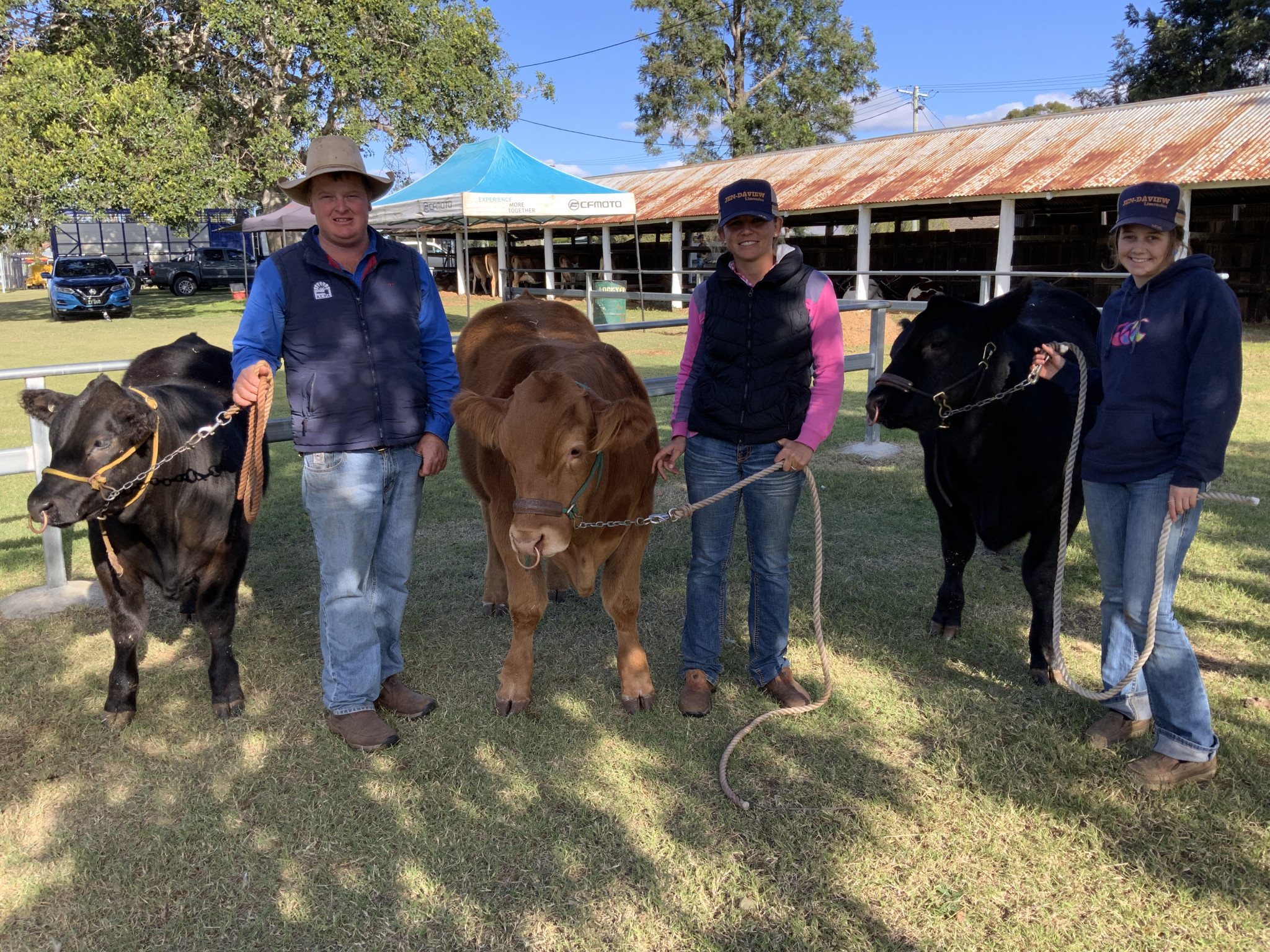 Corey Evans, Mikaela Ross and Amity Campbell at the cattle section.