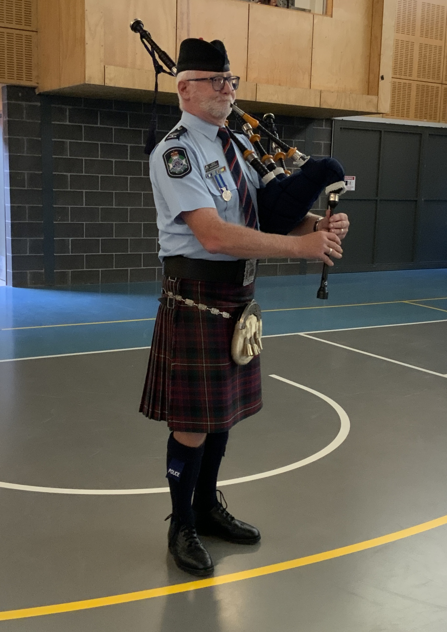 Alistair Bremner plays the bagpipes.