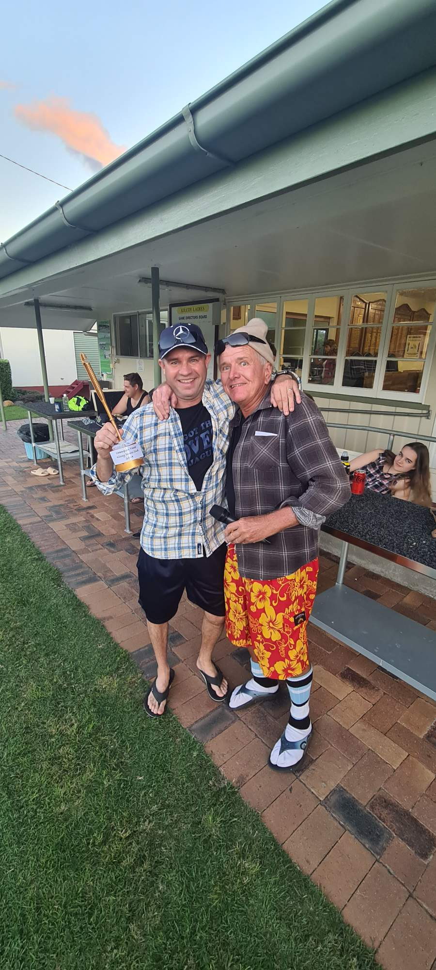 Winner of the Dunny Roll Toss Shane Miles (left), with Rod Goldsbrough.