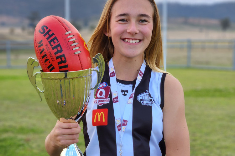 Toogoolawah-based Lily Eggleston savours premiership success with the Sherwood Magpies in the Under 13 Girls Division 2 Brisbane South competition.