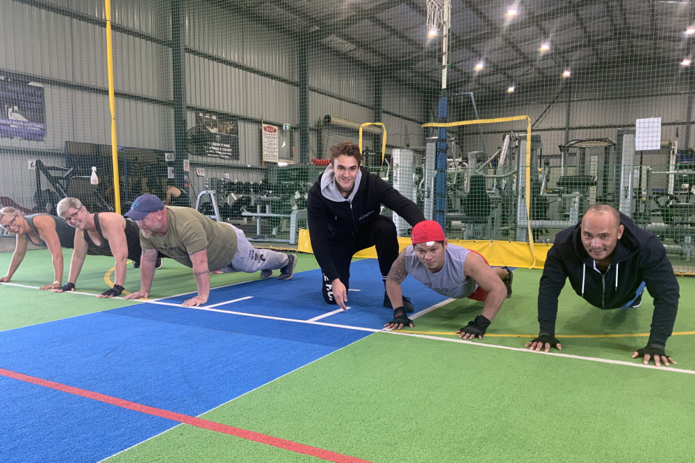 Therese Ferris, Leanne Symonds, Andrew Hoare, Kade Bulow, Nestor Monroid and Isidro Bongcasan start The Push-Up Challenge, to raise funds in aid of suicide prevention.