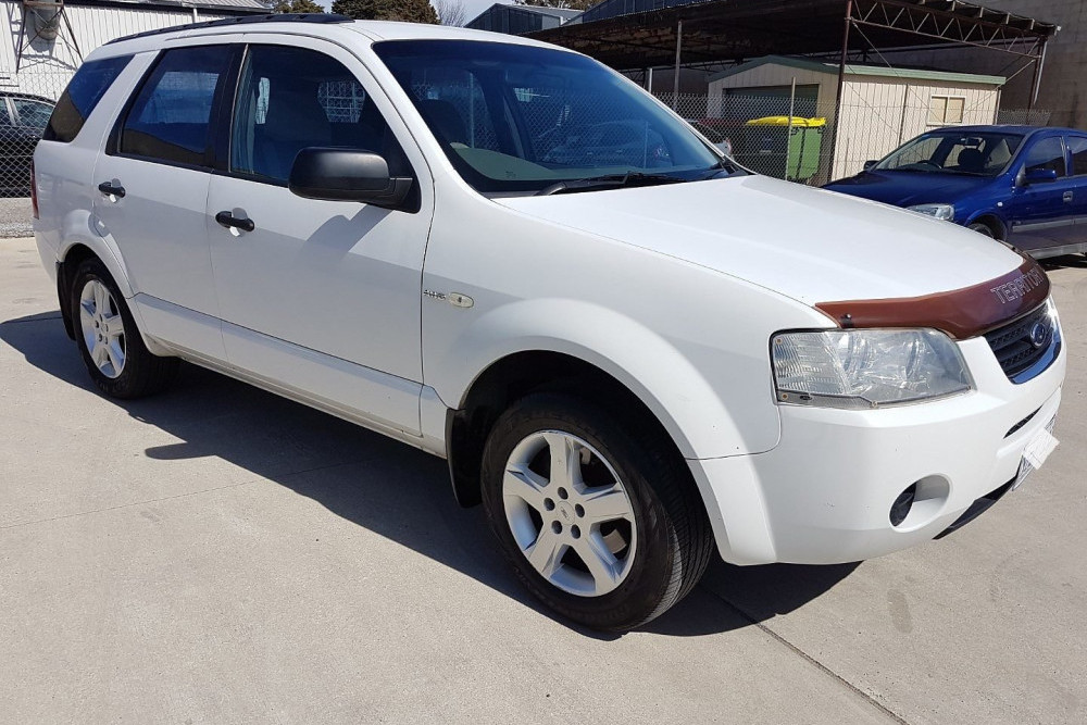 A Ford Territory, similar to the one pictured, was destroyed by fire on Sunday. Detectives would like to speak to anyone who may have information.