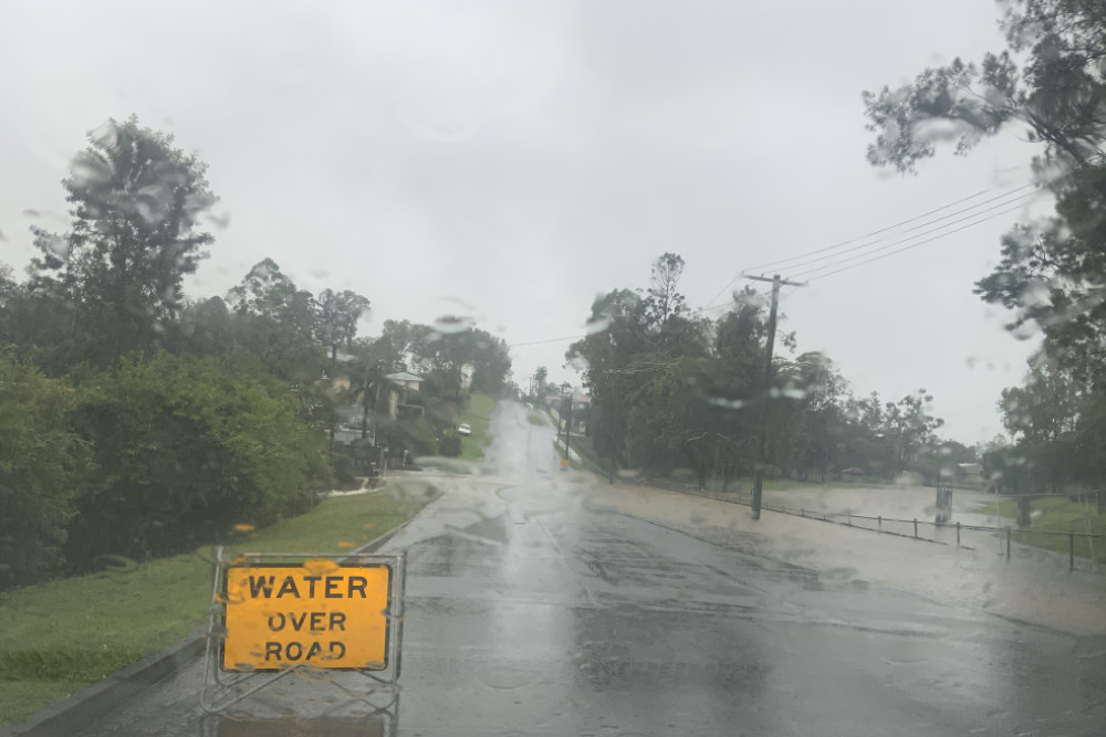 A number of roads in the Kilcoy area have a section where it is unsafe to drive, amid heavy rain.