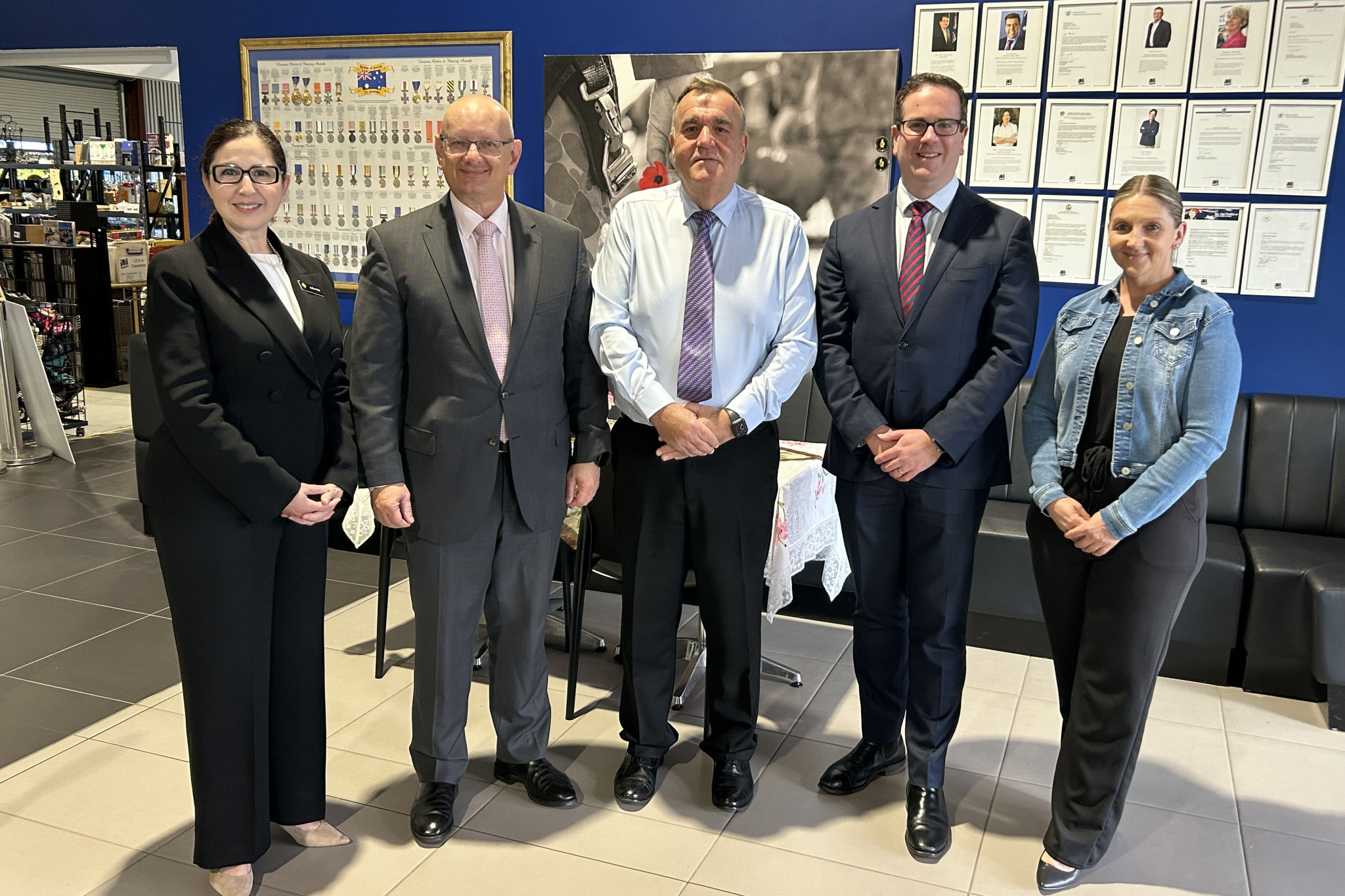 Shayne Neumann MP and Minister for Veterans’ Aff airs and Defence Personnel, Matt Keogh, with Ipswich veteran employer and support organisation Wounded Heroes.