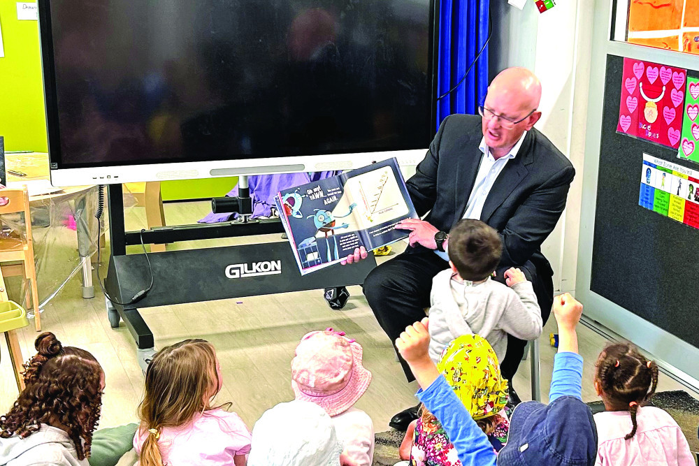 Federal Member for Blair Shayne Neumann visits a local childcare centre to read to the children and chat about the Federal Government’s cheaper child care package.