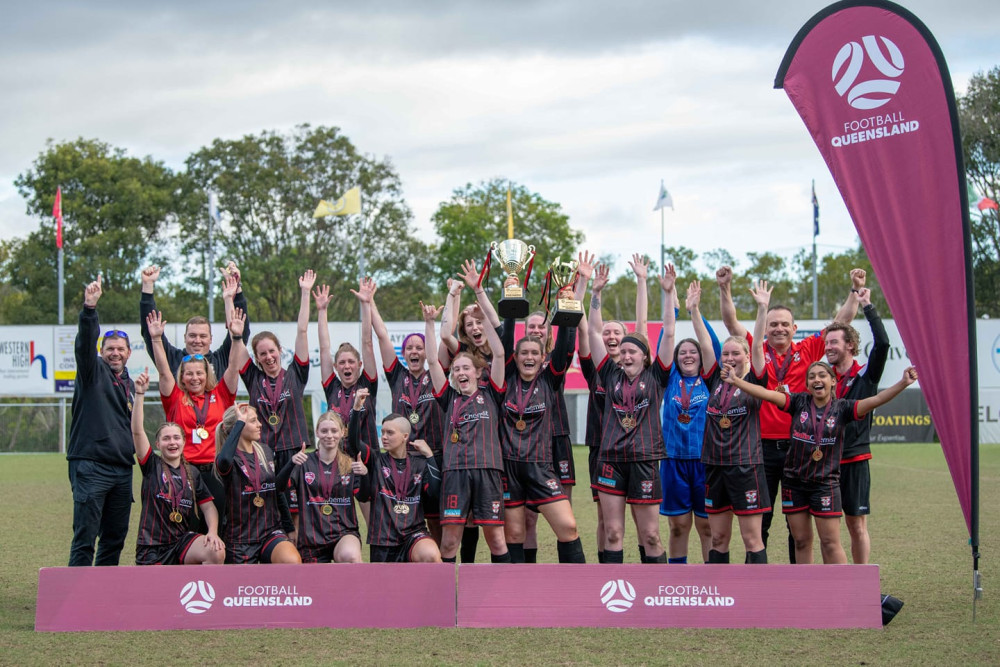 To the victors go the spoils…Caboolture Sports FC celebrates winning the premiership in the FQPL3 Metro U23 Women’s division. Photo credit: atnc photography.