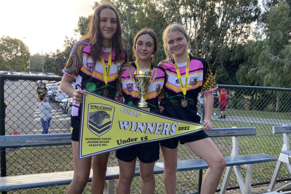 Victoria Poila, Eva Steers and Kasey Smallhorn enjoy Caboolture Black’s premiership in the U15 Girls Division.