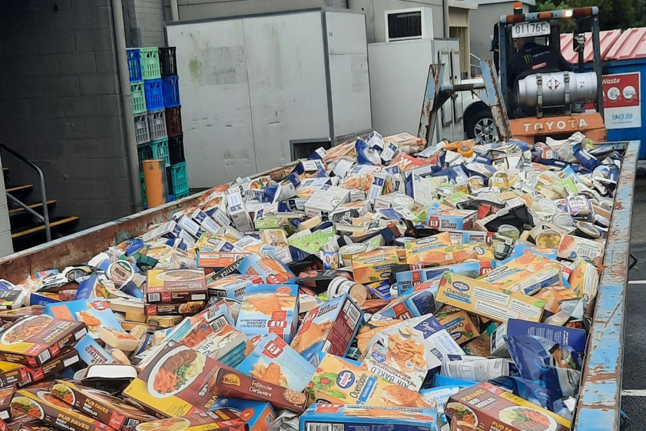 A bin full of frozen meals that had to be disposed of aft er power was cut. Photos: Richard Sampson.