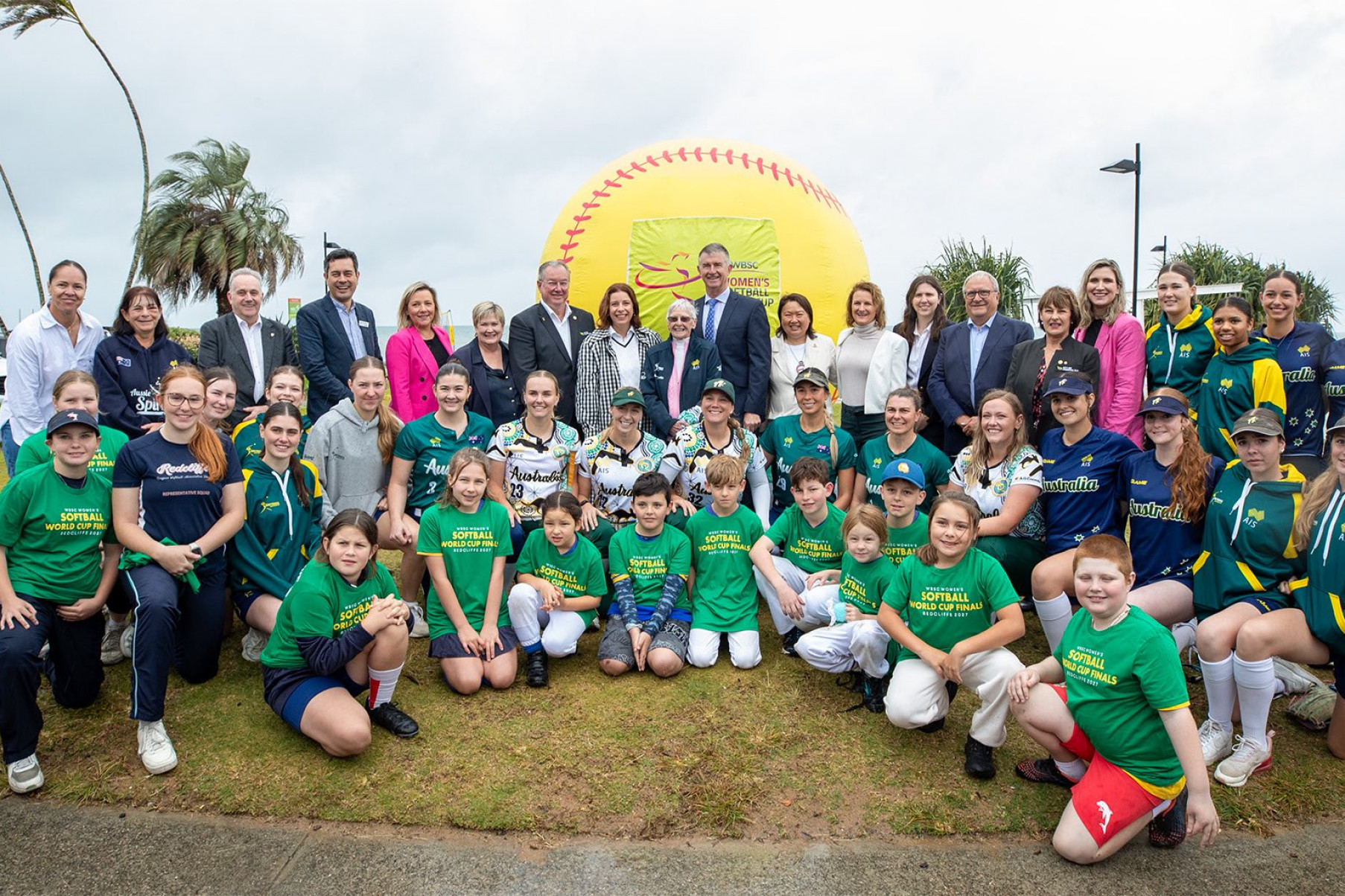 Officials including City of Moreton Bay Mayor Peter Flannery; Minister for Communications and Sport Anika Wells; Minister for Sport, Racing and the Olympic and Paralympic Games Tim Mander; So ball Australia CEO Sarah Loh; and WBSC President Riccardo Fraccari with national and local so ball players.