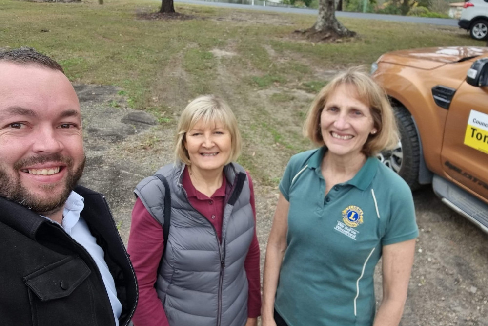 Tony Latter (Moreton Bay Regional Council) and Woodford Lions duo Lynn Barling and Carol McLeod are looking forward to the return of the Woodford Community Carnival and Lantern Parade.