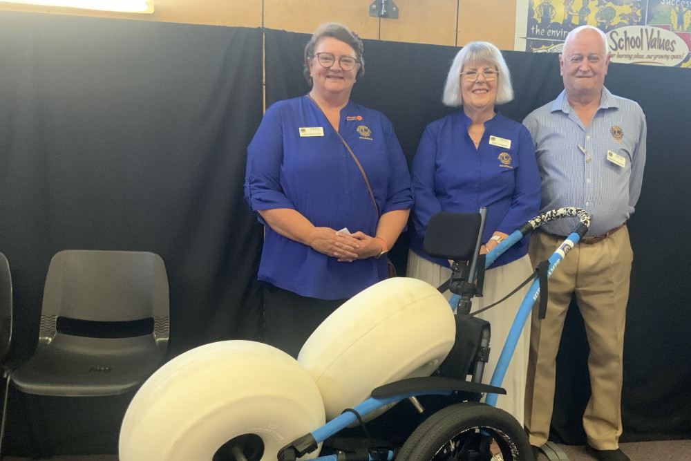 Wamuran Lions Lisa Gourley, Sue Clement and Robert Pedler presented a Hippocampe All- Terrain Wheelchair to Wamuran State School and the wider community.