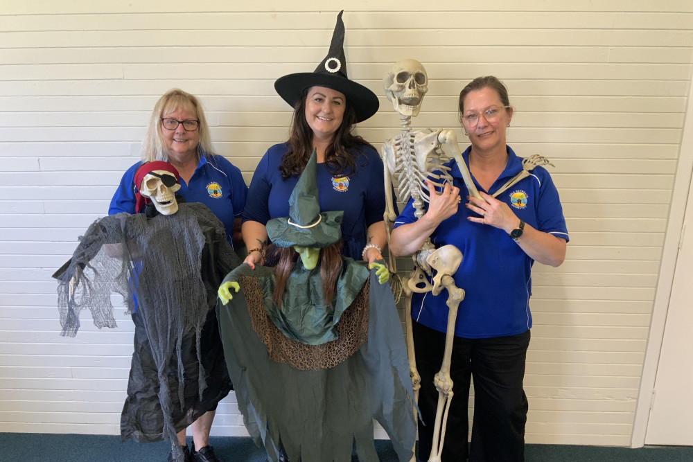 Pauline Trudgett, Rochelle Loveridge and Marieke McArthur get into the spirit of Halloween, in preparation for the Fang-tastic disco.
