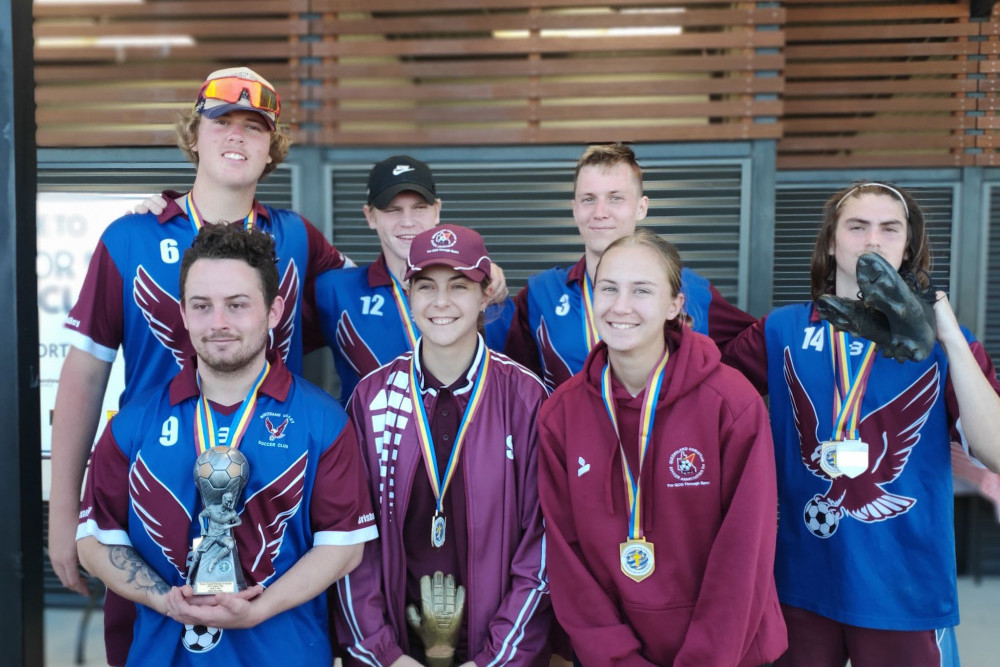 Brisbane Valley players Nick Miller, Harry Kelleher, Cameron Dalzell, Max Hoban (back), Alan Low, Alicija Sajkar and Lilijana Sajkar (front) were named in All Stars teams following standout displays in the national soccer titles.
