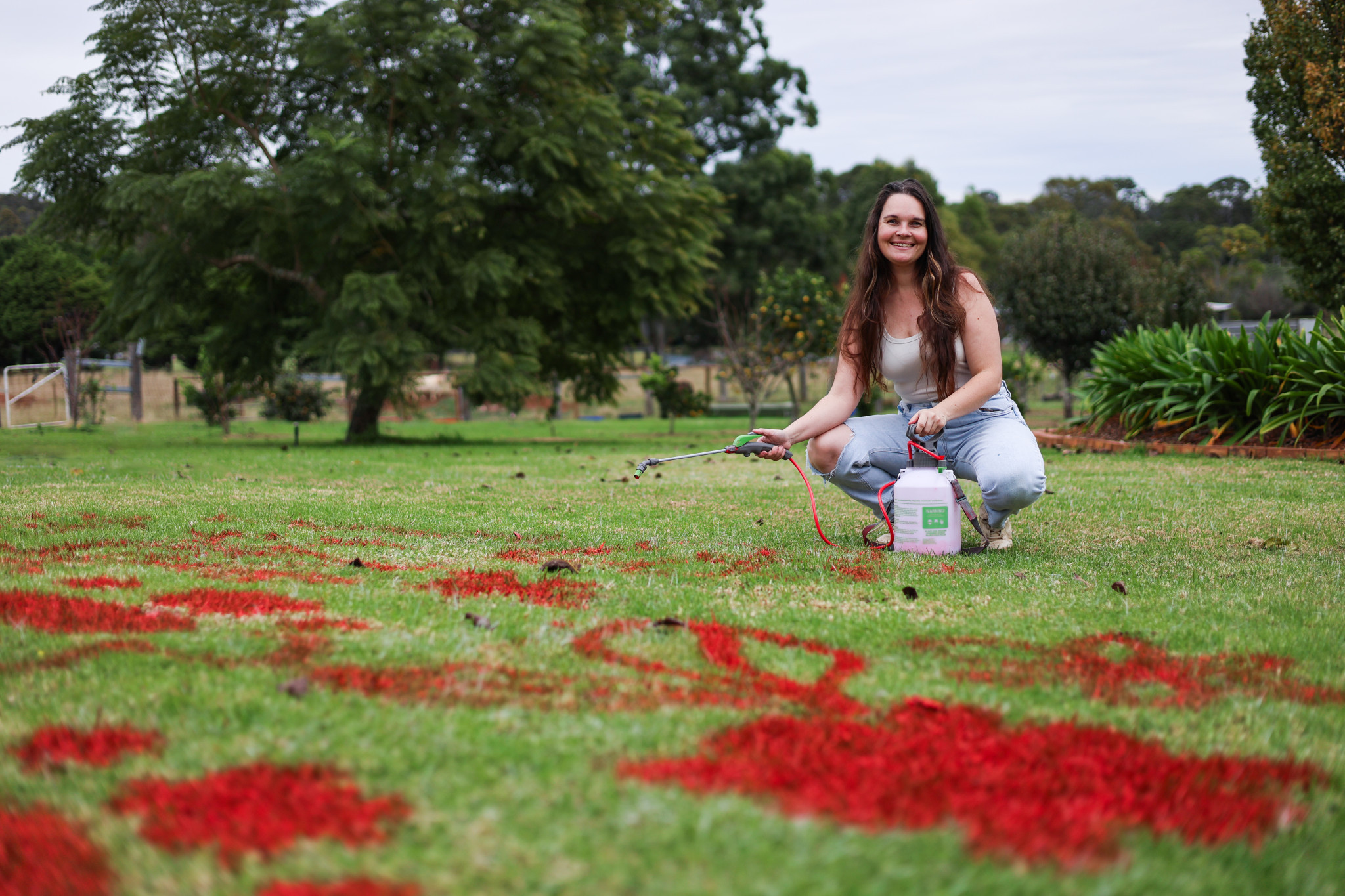 Alex Stalling testing her new grass mural techniques
