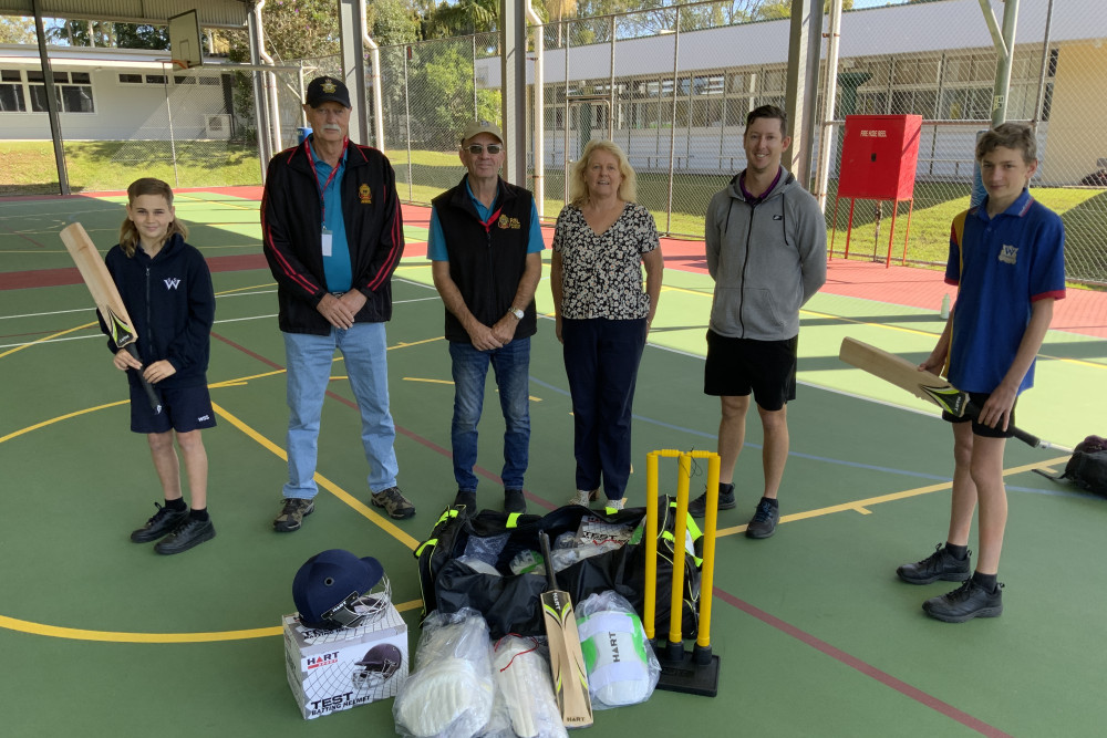 Woodford State School students Ashton (left) and Noah (right) with, from left, Ray Bland and Geoff Sentance from Woodford RSL Sub Branch, and Woodford State School staff Ronnie Hill and Daniel Book.