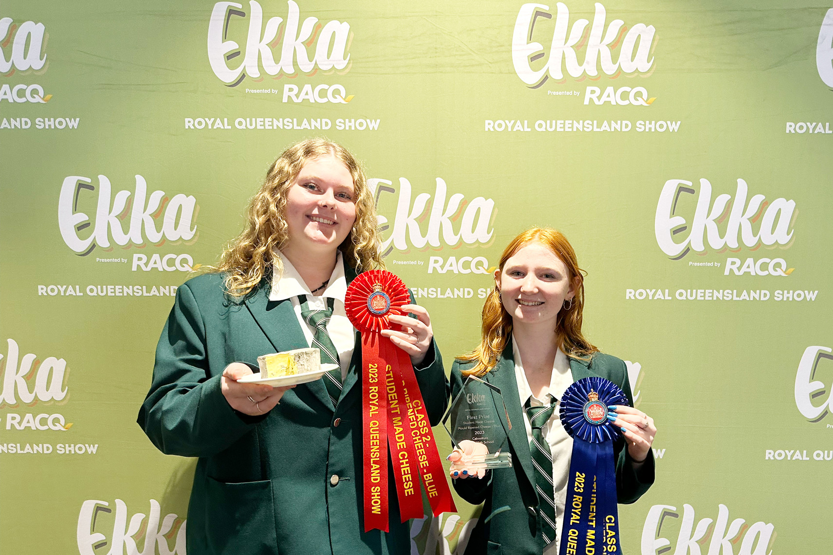 Caboolture State High School students Zyla Rubie (L) and Ashlee Hope with their awards.