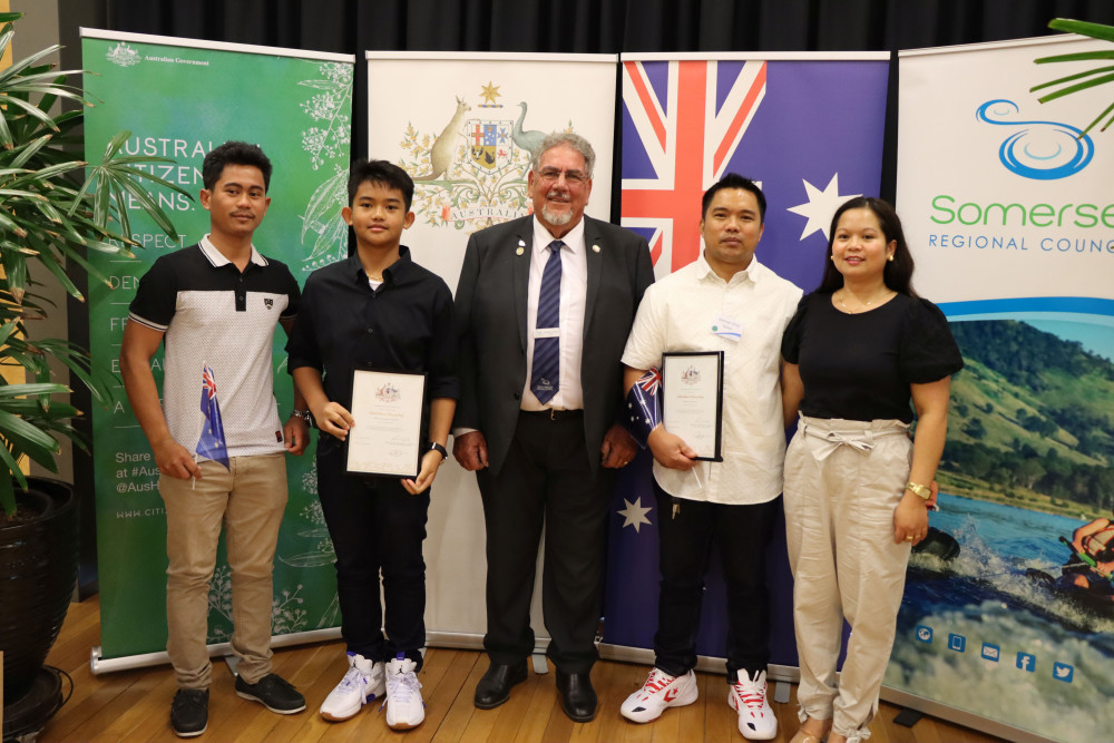 Alemar and John Sinco became Australian citizens. They are pictured with Mayor Graeme Lehmann and guests.