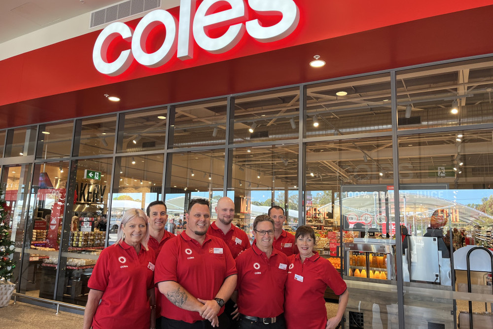 Caboolture Big Fish Coles team members at the grand opening on Friday November 18. Over 100 people were there when the doors opened at 8am.