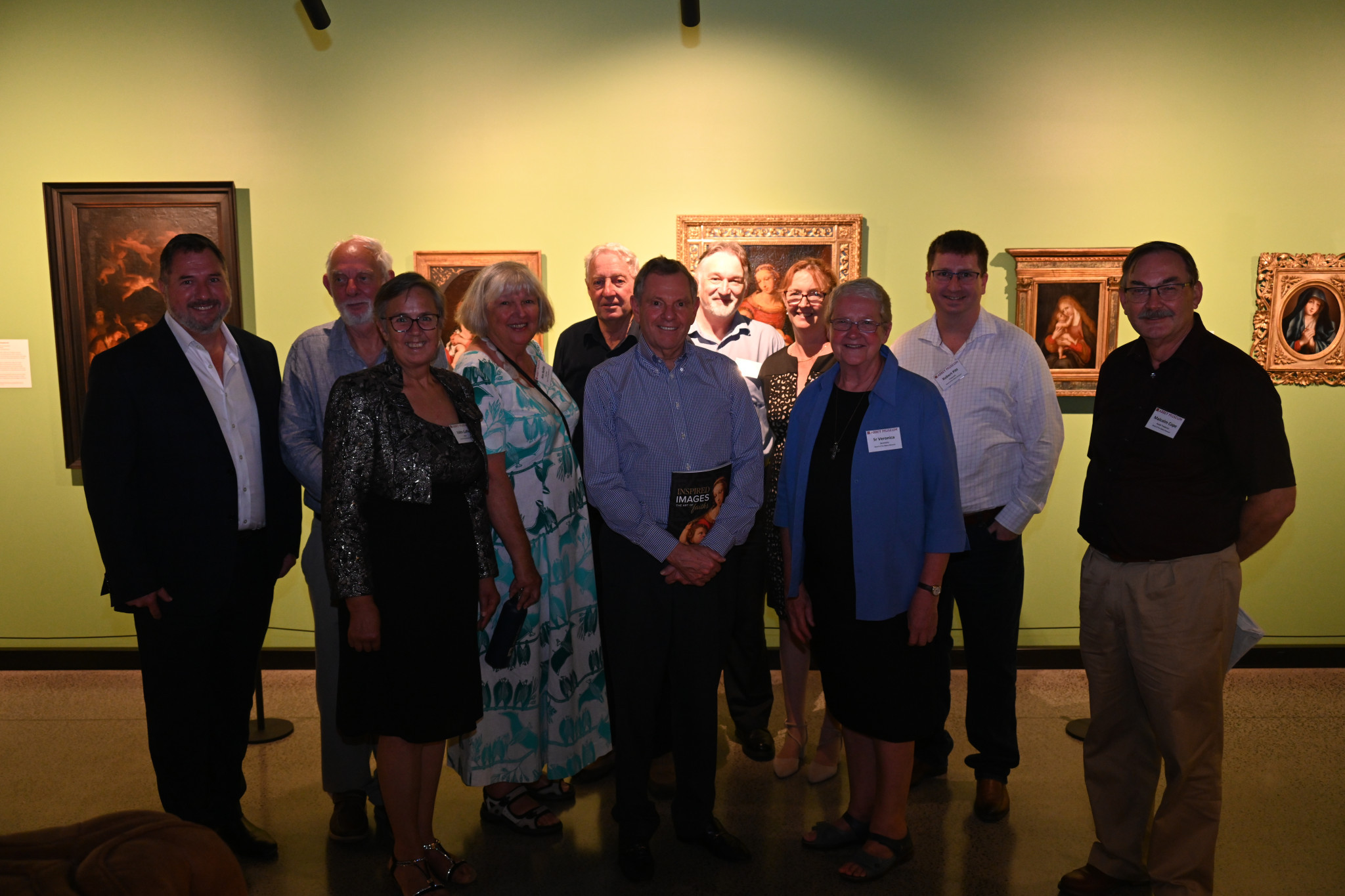 Abbey Museum comittee with Andrew Powell MP (left ) and Phillip Bacon (centre) from the Gordon Darling Foundation, who published the catalogue.