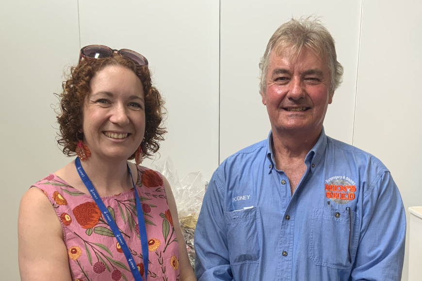 Claire Lyon (community services manager of Legacy Brisbane) and Rodney Hansen (Burpengary and District Men’s Shed president) at the men’s shed’s annual Christmas toy giveaway.