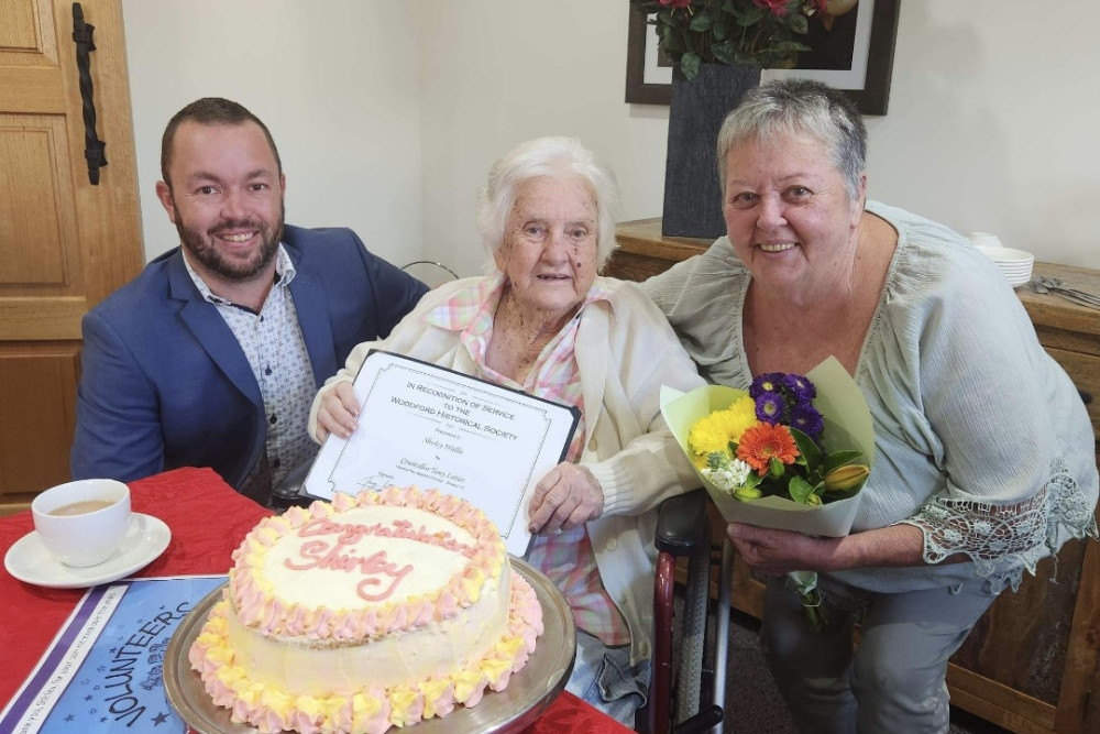 Tony Latter, Shirley Wallis and Donna Grigor at a surprise morning tea, recognising Shirley’s contribution to the Woodford Historical Society and Museum.