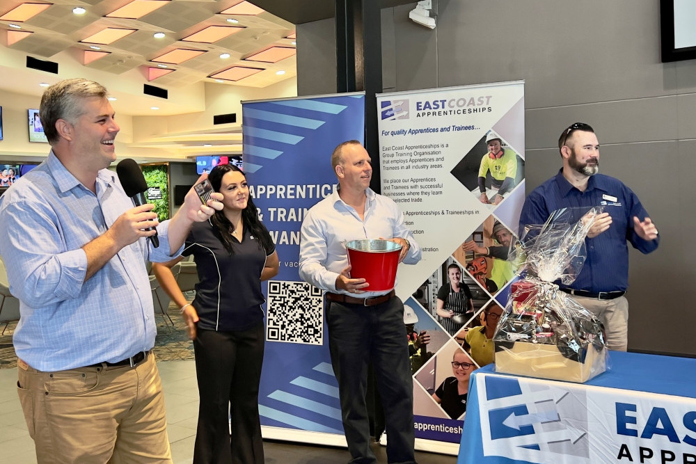 Mark Ryan MP announcing the winner of the lucky door prize at his first business networking coffee catch up event of 2023, which was held at the Caboolture Sports Club on Friday February 10.