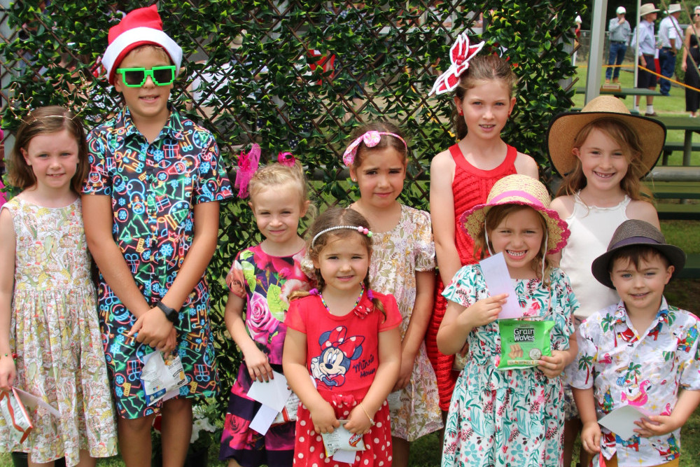 The kids showed off their finest frocks in the Christmas-themed fashions on the field.