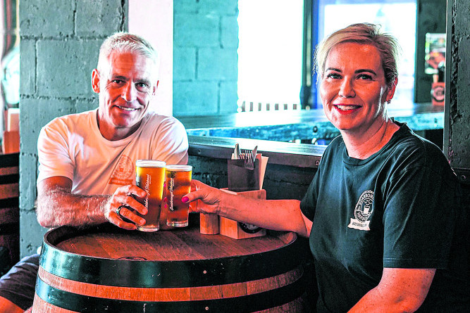 Scarborough Harbour Brewing Co business owners Guy and Sonia Schweitzer celebrate the business’s first birthday.