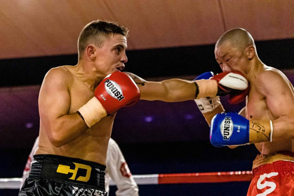 Caboolture’s Connor Dippelsmann lands a blow during his triumphant maiden professional boxing bout. Photo: Four Elements Promotions.