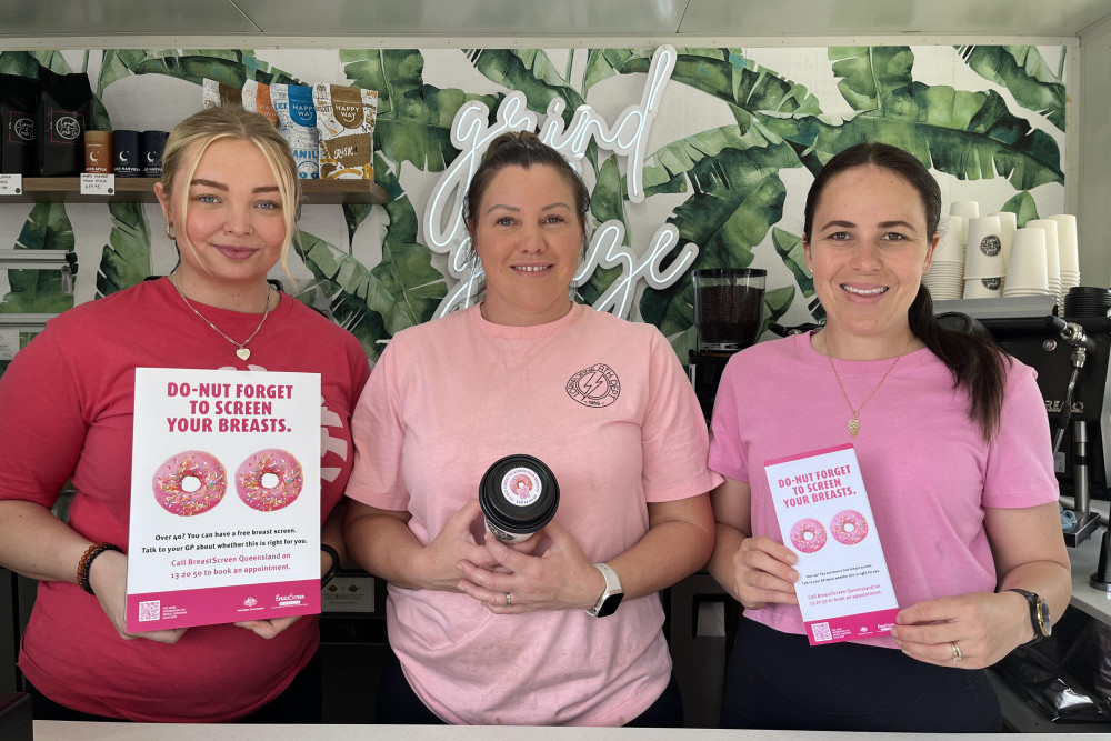 Taylor Bloomfield, Kerri Van Scherpenseel and Josie Arnold from Woodford’s Grind and Graze will be wearing pick, stickering coffee cups with “do-nuts” and handing out flyers every day for the rest of the month to remind women to get screened.