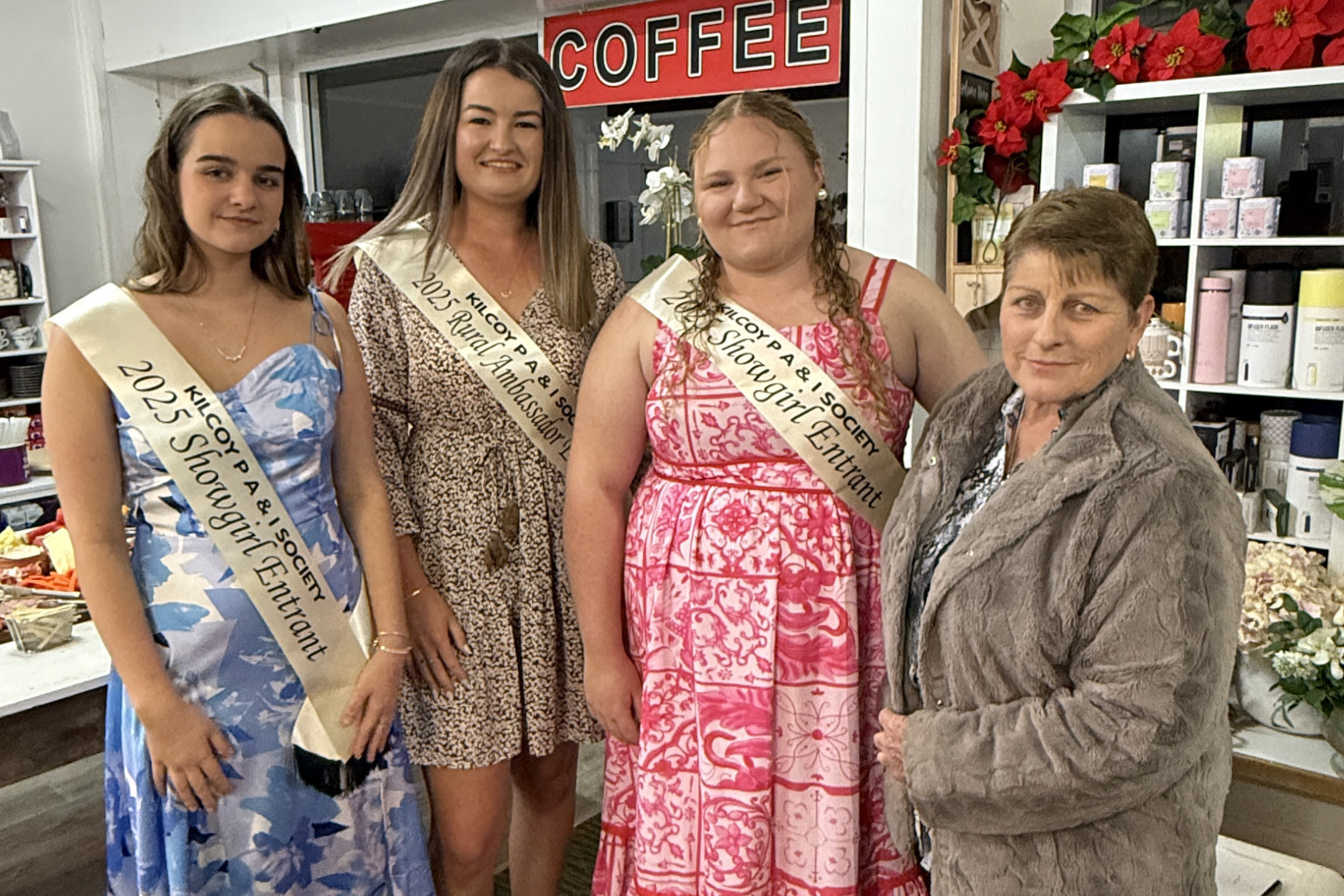 Showgirl entrants Hailey Miles and Millie Retschlag with Rural Ambassador entrant Hanah Retschlag (centre) and Kilcoy PA&I Society President, Susan Pratten.