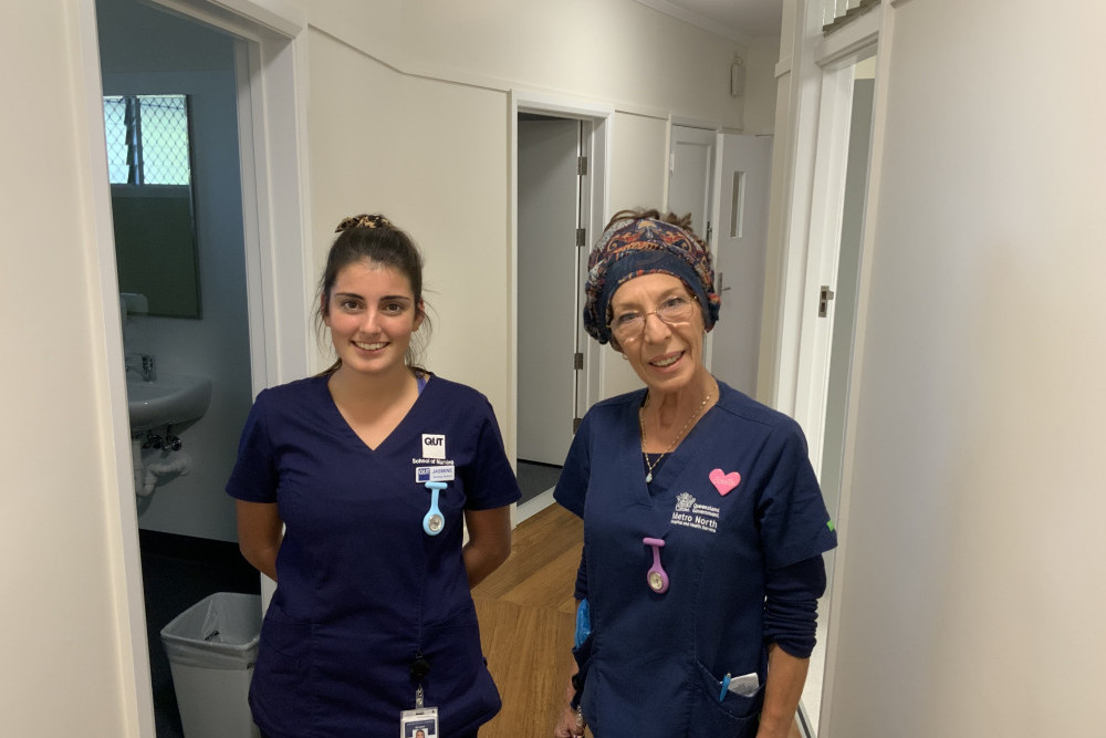 QUT nursing student Jasmine Gaeta and registered nurse Janette Dunkley, pictured in the Old Nurses Quarters at Kilcoy Hospital that features repainted walls, refurbished bathrooms and newly wooden floorboards.