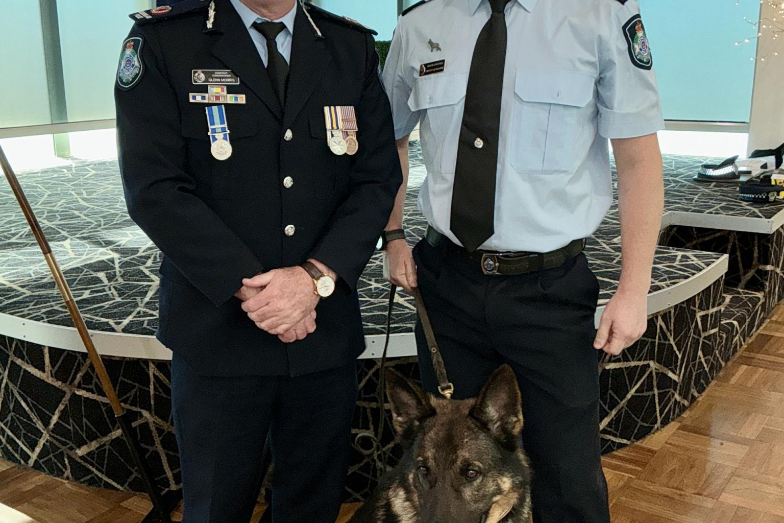 Assistant Commissioner Glenn Morris, PD Gator and Senior Constable Tim Leybourne (dog handler).