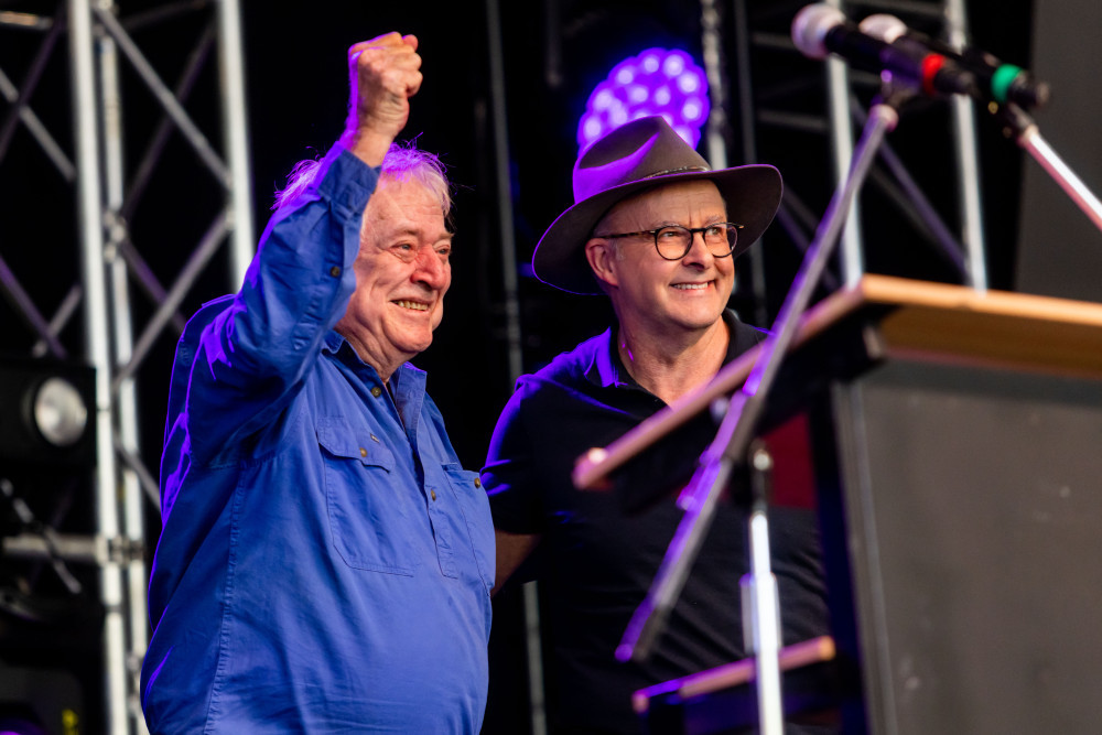 Prime Minister Anthony Albanese addressed the crowd at the Woodford Folk Festival, speaking about his plans for 2023 and honouring the late Bob Hawke. Pictured: Founder and Festival Director Bill Hauritz AM and Hon Anthony Albanese MP. Photo courtesy of Lachlan Douglas.