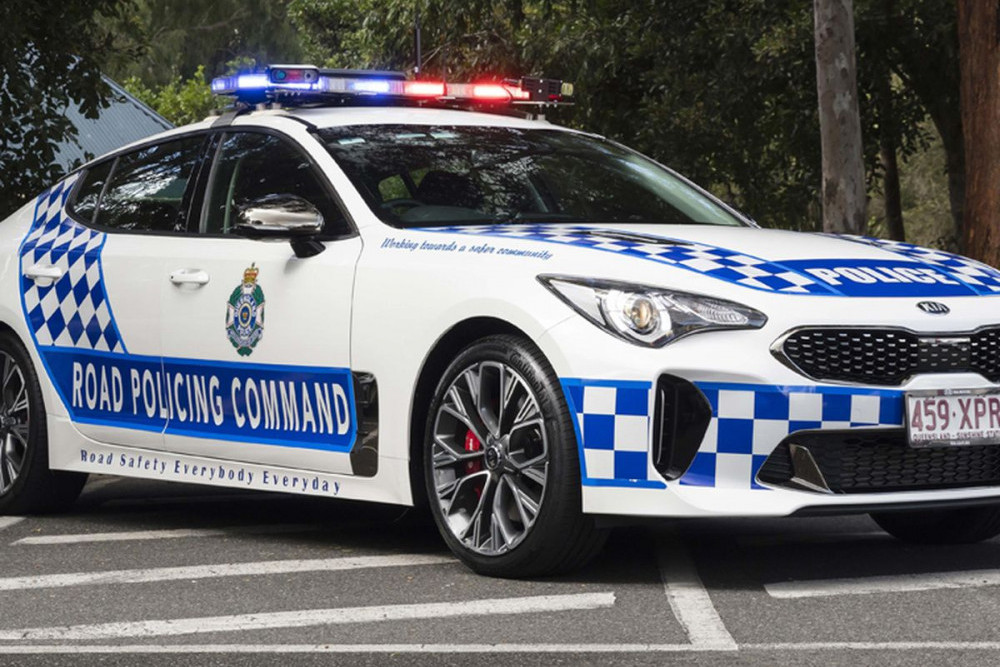 Police have charged two people after a car chase in Elimbah on Monday night
