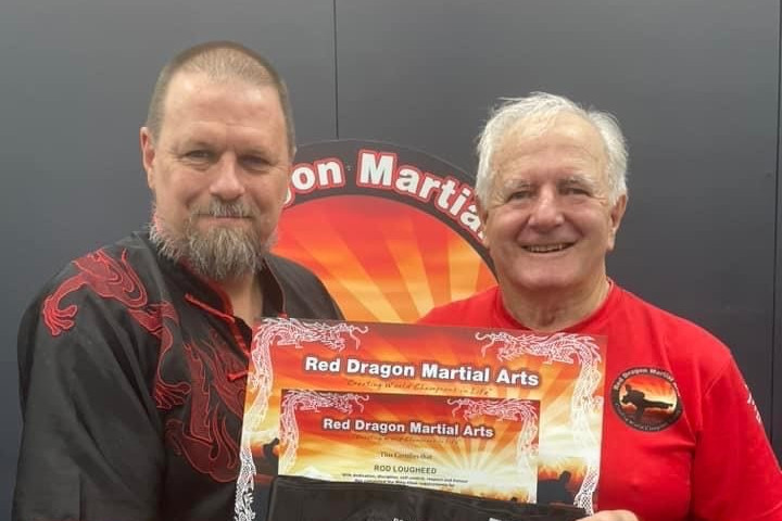 Rod Lougheed (right) has had a memorable journey in martial arts since going through some tough times, with the help of Brett Fenton (left).