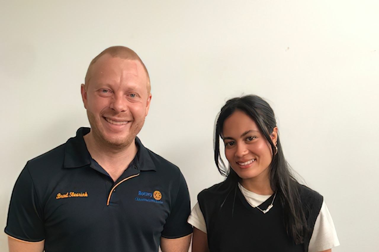 Brad Sleurink (Rotary Club of Redcliffe Sunrise) with Emilie Medina.