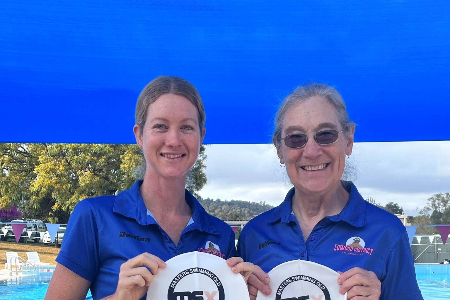 Stephanie Sippel and Karin Reddecliffe from Lowood & Districts Swimming Club, with their bronze caps.